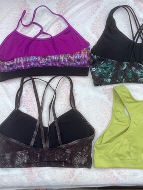 4 sports bras, Alo, Champion and all in motion size L